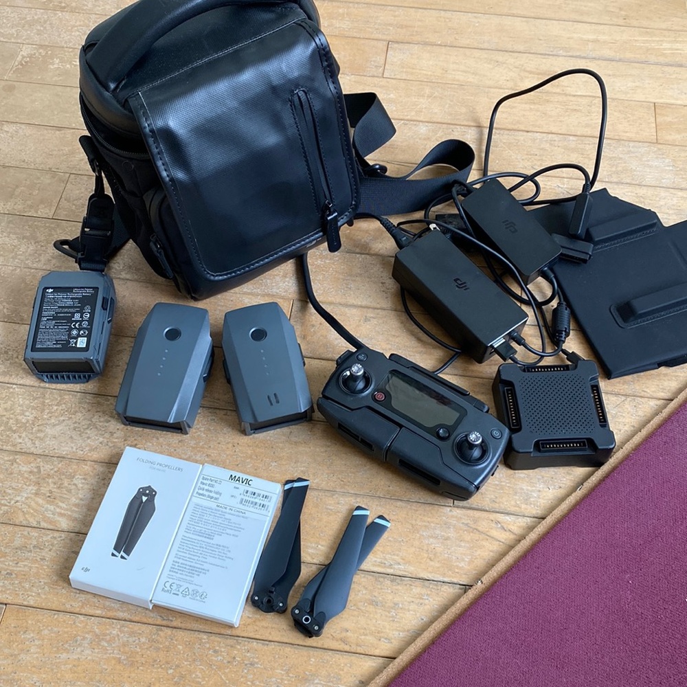 DJI mavic controller, batteries, propellers, chargers, and bag (no drone)